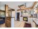 Modern kitchen featuring stainless steel appliances, butcher block counters, and wood accents at 2844 Bellaire St, Denver, CO 80207