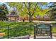 Picturesque view of W.H. Ferguson Park, featuring a playground, gazebo, and open green space at 2844 Bellaire St, Denver, CO 80207