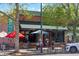 Charming street view of a local bakery, Cake Crumbs, featuring storefront parking and outdoor seating at 2844 Bellaire St, Denver, CO 80207
