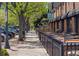 Charming street view of local Bistro Vendome showing outdoor seating available and the surrounding street scape at 2844 Bellaire St, Denver, CO 80207