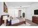 Comfortable bedroom with cozy decor, soft lighting, and neutral colors, providing a peaceful and inviting atmosphere at 3890 S Dayton St # 105, Aurora, CO 80014