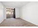 Spacious bedroom with access to a private balcony at 3890 S Dayton St # 105, Aurora, CO 80014