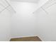 Walk-in closet with wire shelving at 3890 S Dayton St # 105, Aurora, CO 80014