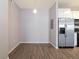 Dining area features an industrial-style light fixture and attractive wood-look flooring at 3890 S Dayton St # 105, Aurora, CO 80014