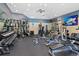 Well-equipped community gym with weightlifting equipment and cardio machines for residents' fitness and wellness needs at 3890 S Dayton St # 105, Aurora, CO 80014