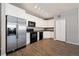 Kitchen featuring stainless steel appliances, granite countertops, and ample white cabinetry at 3890 S Dayton St # 105, Aurora, CO 80014