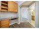 Desk area with cabinets between bedroom and bathroom at 3890 S Dayton St # 105, Aurora, CO 80014