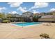 Outdoor pool surrounded by lounge chairs and a pergola, offering a relaxing and inviting atmosphere at 3890 S Dayton St # 105, Aurora, CO 80014