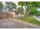 Cozy, one-story home with brick exterior, small front porch and well-maintained lawn at 5274 Alkire St, Arvada, CO 80002