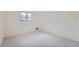 Well-lit bedroom featuring carpet and a window at 1518 Chambers Dr, Boulder, CO 80305