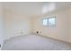 Bright bedroom with carpet flooring and a window offering natural light at 1518 Chambers Dr, Boulder, CO 80305