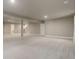 Spacious basement with stairs and doorway access to other areas at 15265 W Baker Ave, Lakewood, CO 80228