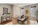 Cozy dining room with elegant table setting, perfect for Gathering gatherings and dinner parties at 15265 W Baker Ave, Lakewood, CO 80228