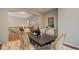 Spacious dining room that connects the kitchen and living room areas, offering a seamless flow at 15265 W Baker Ave, Lakewood, CO 80228