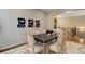 Inviting dining room space with stylish decor, ideal for everyday meals and special occasions at 15265 W Baker Ave, Lakewood, CO 80228