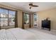 Bedroom features large windows, walkout door and closet space at 15265 W Baker Ave, Lakewood, CO 80228