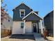 Charming two-story home featuring a stylish front door and modern architectural details at 23782 E 33Rd Pl, Aurora, CO 80019