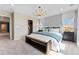 Lovely main bedroom features walk-in closet, ensuite bath, and designer lighting fixture at 23782 E 33Rd Pl, Aurora, CO 80019