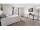 Bright bedroom with a bed and workspace at 3305 S Ammons St # 202, Lakewood, CO 80227