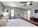 This bedroom features decorations on the walls at 8321 E 33Rd Ave, Denver, CO 80238