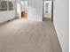 Spacious bedroom featuring neutral carpet, with large windows allowing natural light at 5785 S Lisbon Way, Centennial, CO 80015