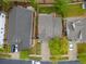 Aerial view of the house showing landscaping, roof and proximity to other homes at 4436 Windmill Dr, Brighton, CO 80601