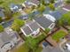 Aerial view highlighting backyard, deck, and proximity to neighborhood amenities at 4436 Windmill Dr, Brighton, CO 80601