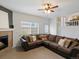 Bright and open living room with a view of the upstairs with lots of room to entertain and relax at 4436 Windmill Dr, Brighton, CO 80601