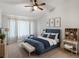 Relaxing main bedroom with a comfortable bed and stylish decor at 4436 Windmill Dr, Brighton, CO 80601