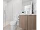 Stylish bathroom with a glass-enclosed shower, sleek vanity, a modern toilet offering a spa-like experience at 1711 Hooker St # 2, Denver, CO 80204