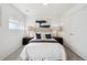 Cozy bedroom featuring soft carpeting, stylish nightstands and accent lamps offering a relaxing space at 1711 Hooker St # 2, Denver, CO 80204
