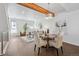 Spacious living and dining area with modern lighting, decor, and an open layout at 1711 Hooker St # 2, Denver, CO 80204