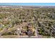Aerial view of the property, highlighting its location in a suburban neighborhood with mature trees at 3105 N Elizabeth St, Denver, CO 80205
