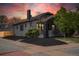 Inviting home featuring modern exterior paint, tidy landscaping, and a cozy, welcoming ambiance at 3105 N Elizabeth St, Denver, CO 80205