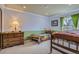 Bedroom featuring two twin beds and a dresser at 1604 Brookside Dr, Highlands Ranch, CO 80126