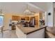 Updated kitchen featuring granite countertops, stainless steel appliances, and ample cabinet space at 1604 Brookside Dr, Highlands Ranch, CO 80126
