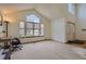 Bright living space featuring vaulted ceilings and large windows, plus a work from home nook at 1604 Brookside Dr, Highlands Ranch, CO 80126