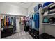 Spacious walk-in closet with shelving and plenty of room for storage and organization at 401 Clubhouse Dr, Fort Lupton, CO 80621