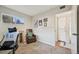 Neutral bedroom with carpet, natural light, and a comfortable chair, offering a cozy atmosphere at 9150 Fir Dr, Thornton, CO 80229