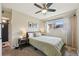Bedroom featuring a ceiling fan, neutral walls, and natural light at 9150 Fir Dr, Thornton, CO 80229