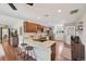 Spacious kitchen with stainless appliances, wood cabinets, and granite countertops at 9150 Fir Dr, Thornton, CO 80229