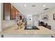 A kitchen with a granite countertop, stainless steel appliances, and wood cabinets at 9150 Fir Dr, Thornton, CO 80229