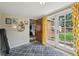 View of a room showing the open doors to the yard and the connecting hallway at 9150 Fir Dr, Thornton, CO 80229