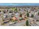 Aerial view showcasing a residential neighborhood near Louisville Community Park with mature trees at 930 Parkview St, Louisville, CO 80027