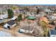 Aerial view of a residential neighborhood with various houses and mature trees at 930 Parkview St, Louisville, CO 80027