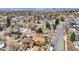 Aerial view showcasing a quiet residential neighborhood with mature trees and well-maintained streets at 930 Parkview St, Louisville, CO 80027