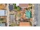 Aerial shot of a residential property showcasing the rooftop, backyard, and adjacent street at 930 Parkview St, Louisville, CO 80027