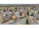 Aerial view showcasing a residential neighborhood with mature trees and colorful homes at 930 Parkview St, Louisville, CO 80027