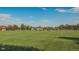 Expansive community park, great for walking and activities under a beautiful bright blue sky at 930 Parkview St, Louisville, CO 80027