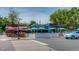 Vibrant outdoor patio area with colorful umbrellas and wooden decking, offering a lively dining experience at 930 Parkview St, Louisville, CO 80027